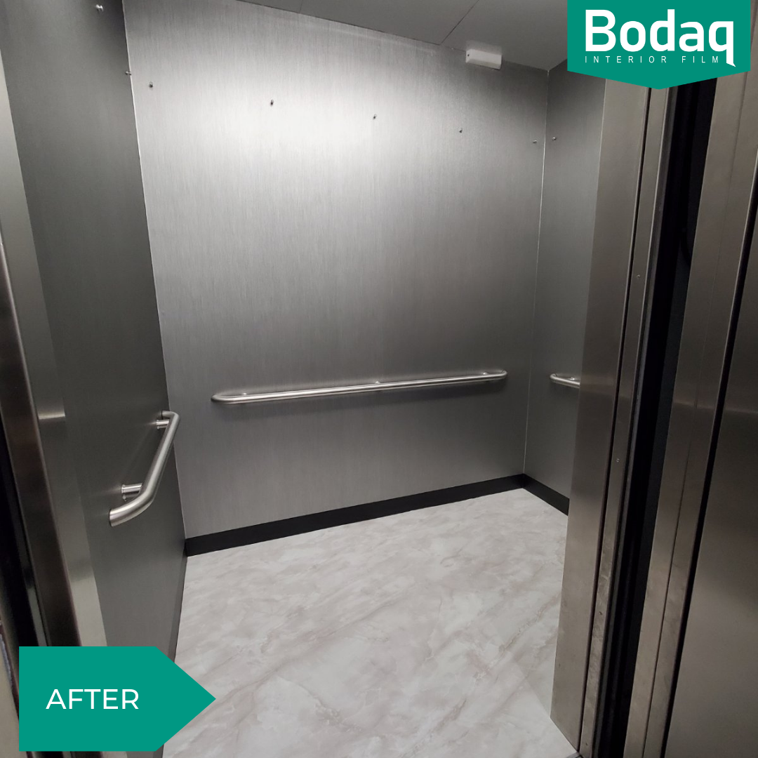 Elevator enclosure refinishing (wall panels, ceiling, and floor) - AFTER