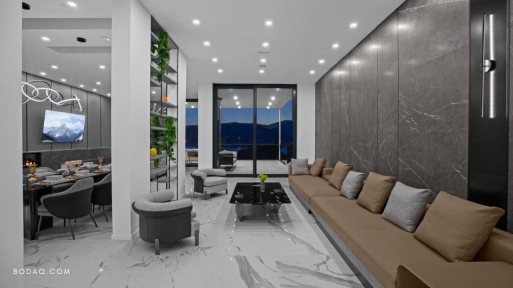 Wall paneling design ideas: PM006 Pietra Grey Marble applied to a wall paneling in the living room