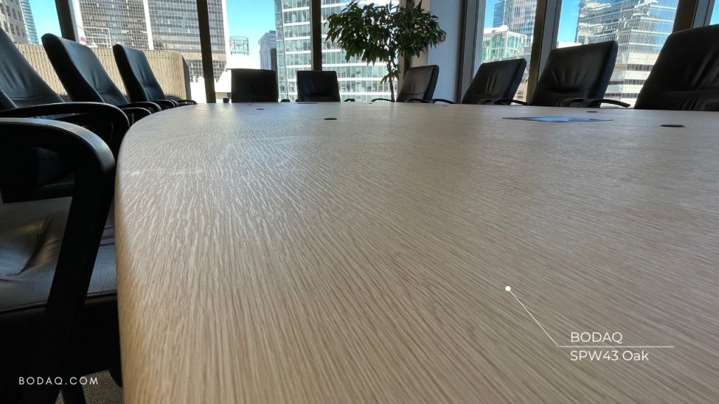 SPW43 Oak architectural film pattern applied to the meeting room table