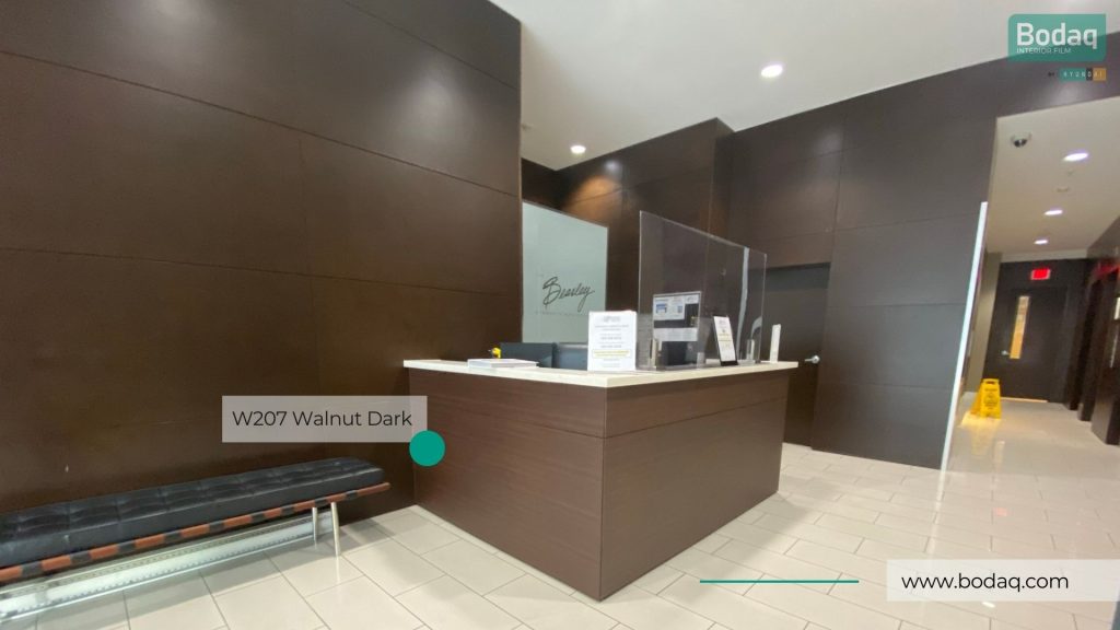 Residential Building Lobby Reception Desk and Wall Panels Refinished with W207 Walnut Dark